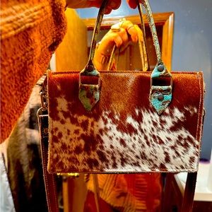 Holy Cow Couture Itty Bitty tote. Red roan and turquoise leathering.